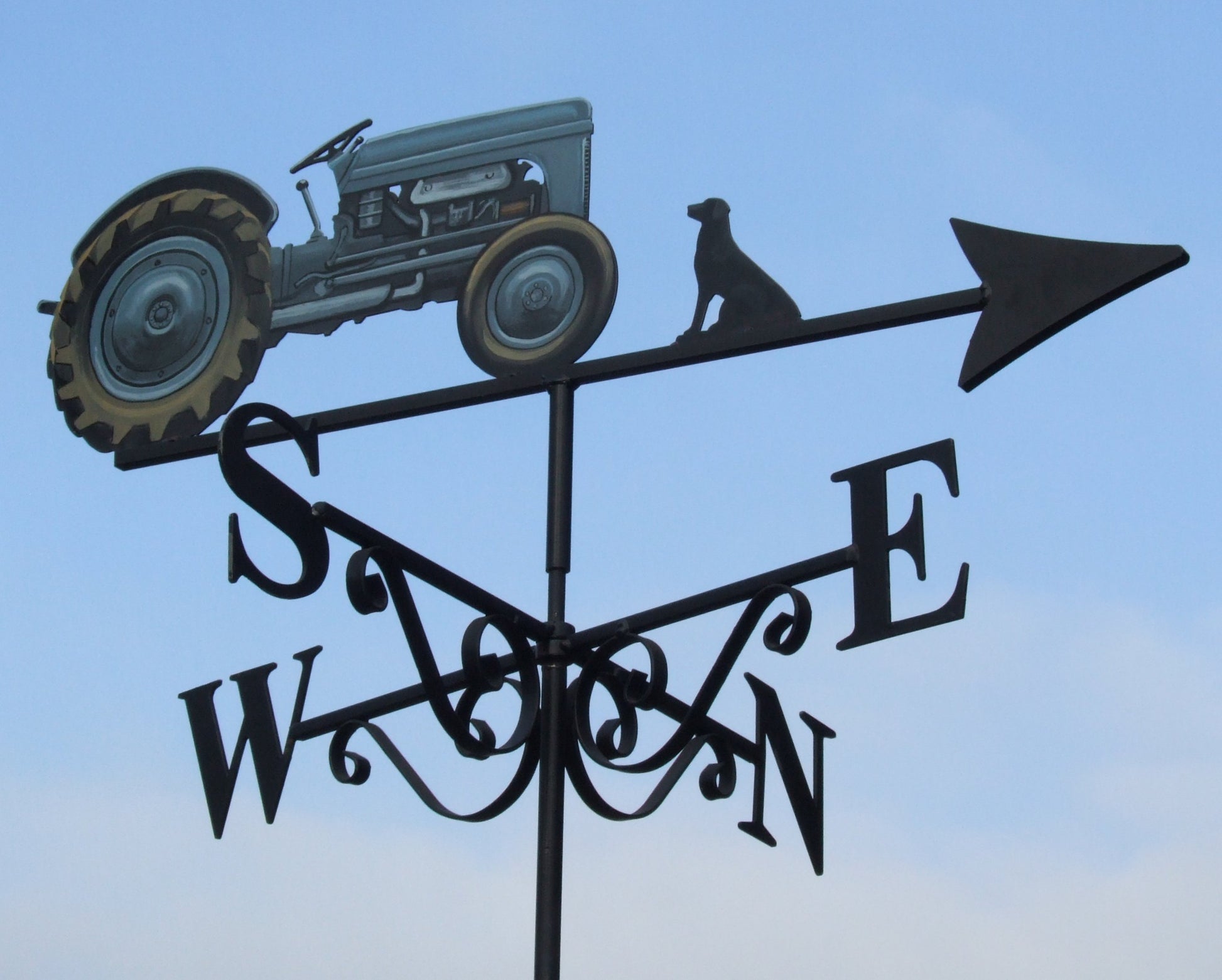 A 1948 tractor Fergie which had been hand painted and made into a weather vane