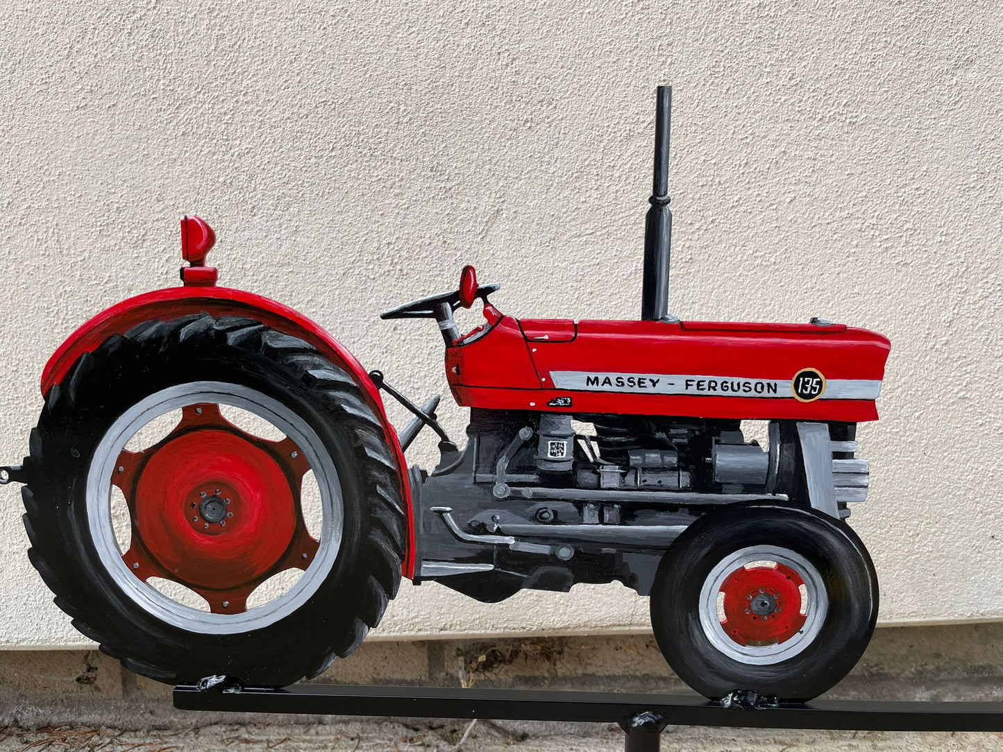 Artist painted weathervane of Massey Ferguson 135 tractor