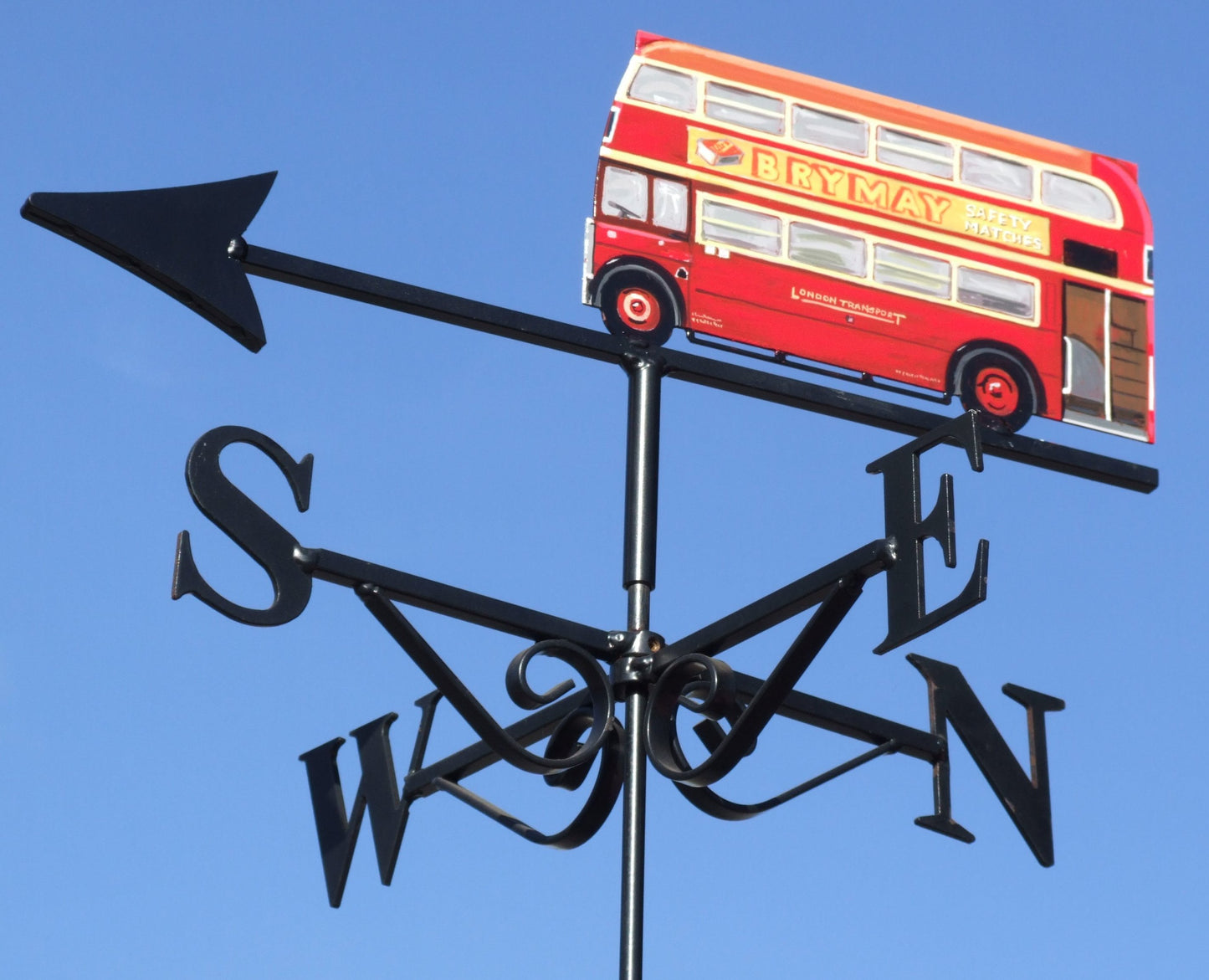 Red London bus weathervane left door side steps