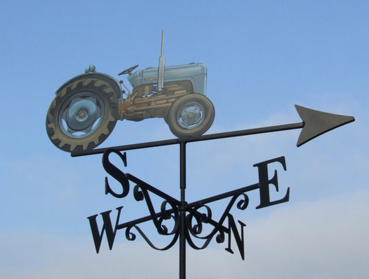 Goldilocks tractor painted blue as a weather vane