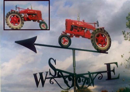 Farmall tractor painted red and made into a weather vane